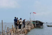 Ilustrasi pagar laut di Desa Kohod, Pakuhaji, Kabupaten Tangerang. (Azmi Samsul Maarif/Antara)